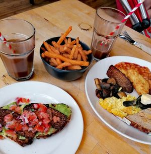 Avocado and tempeh open sandwich, vegan full English, sweet potato fries and iced mochas at DANA in Sheffield