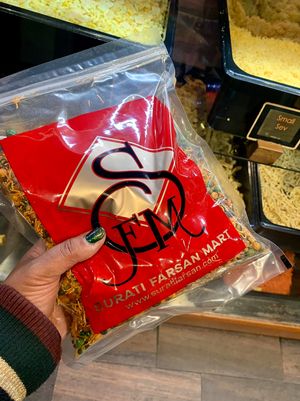 Savory snacks at the counter - you pick a (weight based) size and they package it up for you.  at Surati Farsan Mart in Artesia