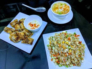 Mixed fried rice, vegetable soup and fried spring rolls at Nha Hang Com Chay in Ha Long