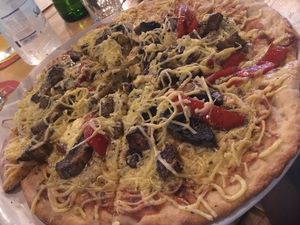 pizza with vegan cheese at Evilion Bistro in Crete