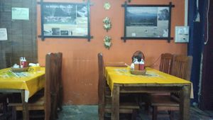 Seating inside or at street with fan at Song Fang Khong in Thakhek
