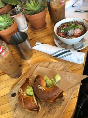 Bagel without scrambled egg and açai bowl  at The Butcher's Daughter - West Village in New York City