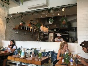 This is a view from inside, looking toward the (open) kitchen. at The Butcher's Daughter - West Village in New York City