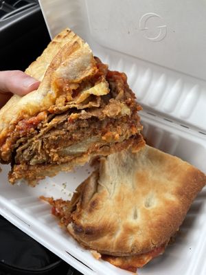 Chicken eggplant parmigiana sandwich on fried dough at Three Girls Vegan Creamery - Boston in Guilford