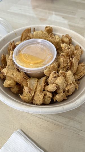 Blooming onion with “secret sauce"  at Three Girls Vegan Creamery - Boston in Guilford