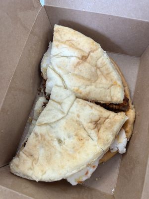 Chicken parm sandwich on fried dough at Three Girls Vegan Creamery - Boston in Guilford