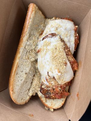 Chicken parm sandwich on baguette at Three Girls Vegan Creamery - Boston in Guilford