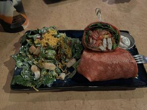 Vegan buffalo chicken wrap with a side vegan caesar salad  at Taps Brewhouse & Grill in Niagara Falls