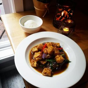 stir-fried tofu and thai eggplant with rice on the side at Khun Nine Thai in Baltimore