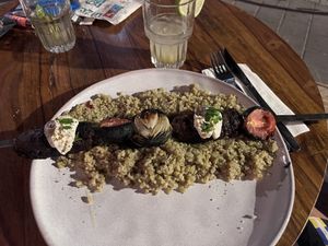 Kebab with labane, tomato, onion  at Michelangelo Cafe in Tel Aviv