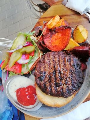 mushroom soya burger with roasted beets and sweet potato at Michelangelo Cafe in Tel Aviv