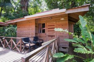 One of our two person queen-bungalow villas sleeps two and is in the heart of our jungle gardens. It has a private bath and even a small kitchen. Our property is on a beautiful river, and has a newly refurbished outdoor pool for rejuvenation every day of the year (it's never cold in Costa Rica). 
 at El Mono Feliz in Ojochal De Osa