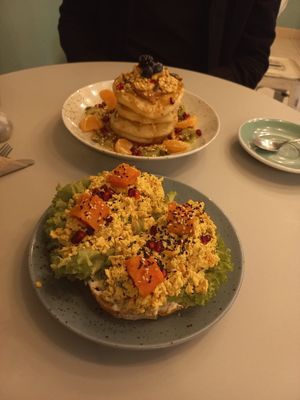 Pancake tower and scrambled tofu toast at Glow in Luxembourg City