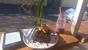 Chocolate waffle stack! And a Berry smoothie. Was amazing! at Nourish'd Cafe & Juicery - Kloof in Cape Town