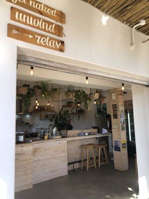 From the balcony looking in  at Nourish'd Cafe & Juicery - Kloof in Cape Town