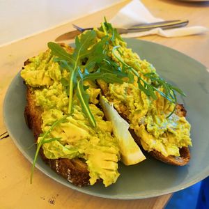 Smashed avo on toast   at Nourish'd Cafe & Juicery - Kloof in Cape Town