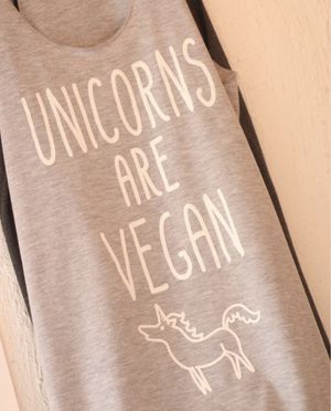 The staff shirts 🦄🤩  at Nourish'd Cafe & Juicery - Kloof in Cape Town