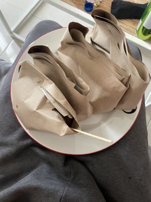 Wonderfully efficient packaging, nice and clean, never soggy. Wrapped in banana leaves inside the paper. at Warung Pande Vegan - Canggu in Canggu