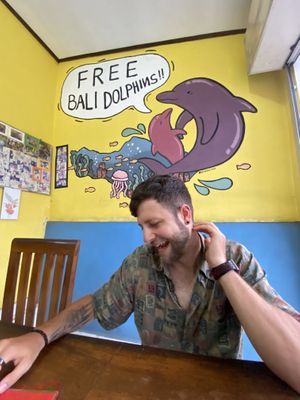 Love their wall art ft my crazy boyfriend 😝  at Warung Pande Vegan - Canggu in Canggu