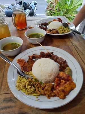 2 Nasi Campur that come with soups and 2 iced teas ($6.60 AUD) at Warung Pande Vegan - Canggu in Canggu