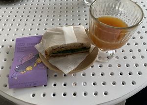 Lada Sedan sandwich with orange coffee  at Sereda in Kyiv