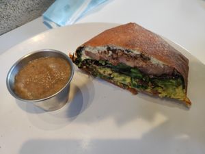 Crunchwrap (half eaten) at Under the Sun Cafe in Long Beach