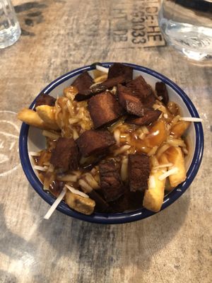 Vegan gravy bacon fries   at Bread Meats Bread in Edinburgh