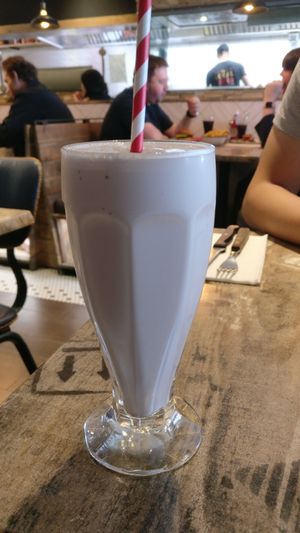 Vegan strawberry milkshake made with vegan ice cream at Bread Meats Bread in Edinburgh