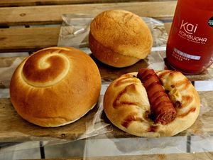 Hot dog bun, pineapple bun, and custard bun at HiPizza in Taipei