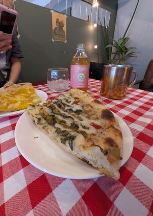 Tried their pizza. (Pickled mustard green, quattro formaggi) The crust was a tad tough. The toppings were great. at HiPizza in Taipei