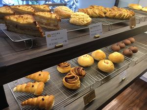 Selection of pastries (front wall) at HiPizza in Taipei