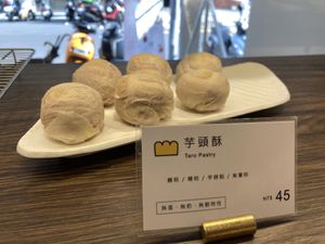 Taro pastries on a rack at HiPizza in Taipei