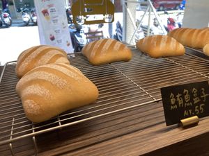 Tuna rolls on a rack at HiPizza in Taipei