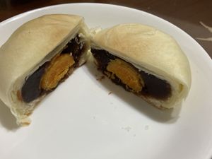 Inside of a salted “egg yolk" pastry at HiPizza in Taipei