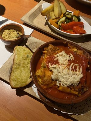 Vegan lasagne with garlic bread and nutritional yeast at Marcellos of Douglas in Cork