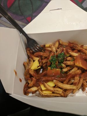 Vegan poutine! I am not 100% sure, but I think they used Chao for the cheese "curds". at Fox & Son Fancy Corndogs in Philadelphia