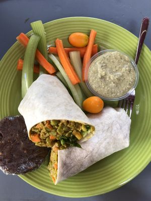 Full wrap with curry split peas, and a side of lentil hummus comes with veggies at Desert Roots Kitchen in Tempe