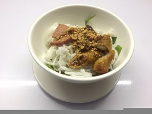 Cold noodle with spring roll and mock ham.  at Sweet Root Vegetarian Restaurant  in Phnom Penh