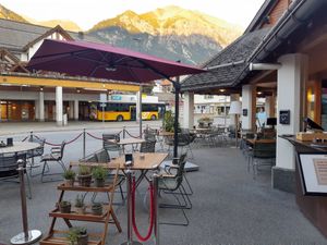View from outdoor seating at Hotel Schweizerhof Lenzerheide in Lenzerheide