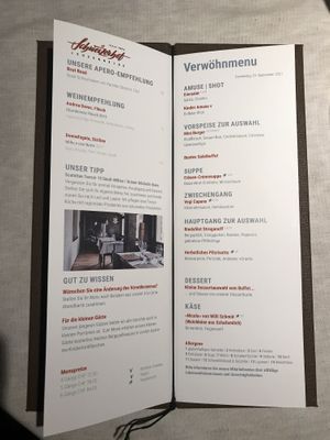 Menu for hotelguests. Not vegan but they served me instead: Falafel with humus, mini pulled planted burger, carrot-ginger soup, vegan capuns, chestnut ragout and sacher cake. at Hotel Schweizerhof Lenzerheide in Lenzerheide