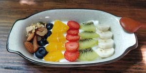 Yoghurt fruit bowl, so small, it's stupid at Metta Vegetarian in Ho Chi Minh City