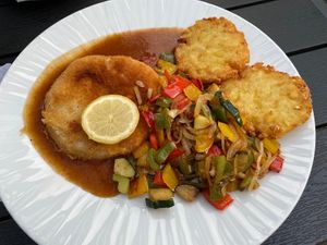 Celery schnitzel with fried potato hash browns and veggies. Delish! at Hotel Gasthof Schaeffler in Sonthofen