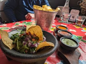 Chips and Guac. Get without cheese.  at Milagros Latin Kitchen in Redwood City