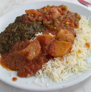 3 vegan curries on rice. There was a choice of about 6 or 7 at Little Aladdin in Manchester