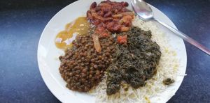 Rice and three. Littlensngo sauce on the top left there. at Little Aladdin in Manchester