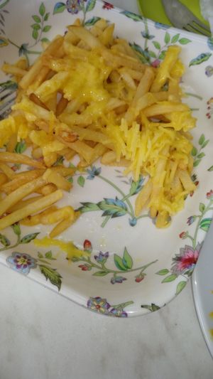 Cheesy chips - half eaten sorry at Little Aladdin in Manchester