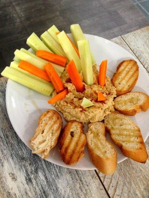 Hummus with bread and vegetables at Vegan Point in Ibiza