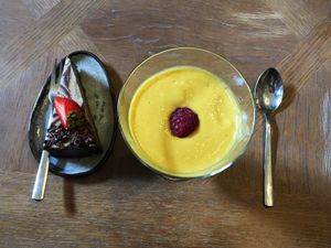 Chocolate cake with mango lassi. at Toormoor Kohvik/Galerii in Tallinn