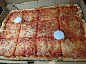 Half sheet vegan cheese at Rossi's Pizza in Johnson City