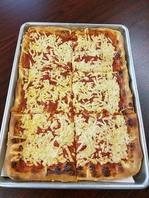 Quarter Sheet Pizza w/ Vegan Mozz at Rossi's Pizza in Johnson City